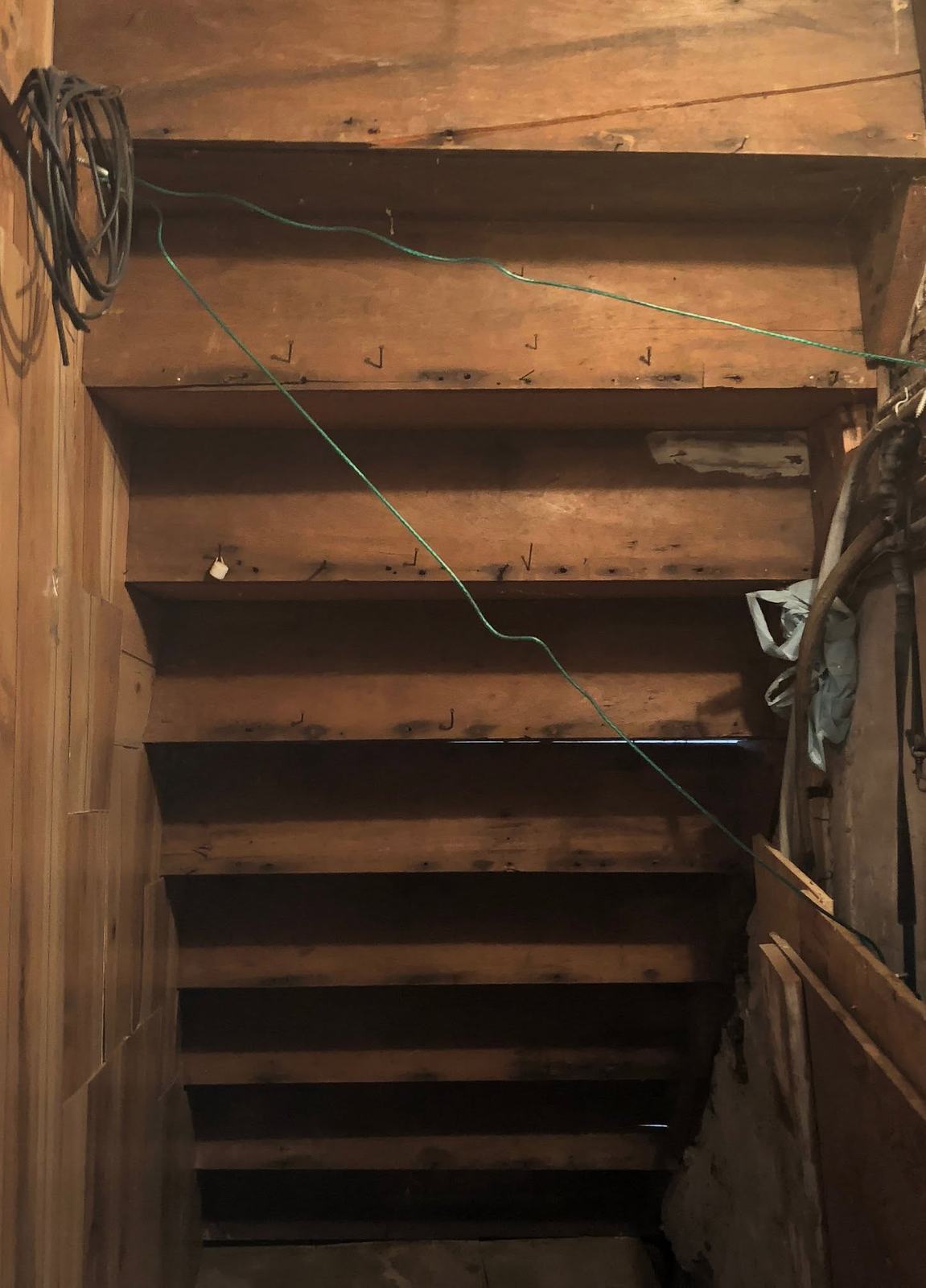 Worn cellar stairs before the rebuild